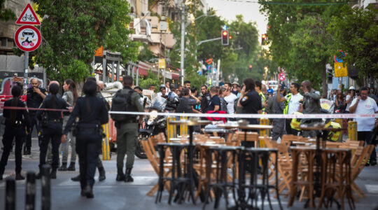 Police and rescue forces at the scene of a terror attack in Tel Aviv on August 5, 2023. (Avshalom Sassoni/Flash90)